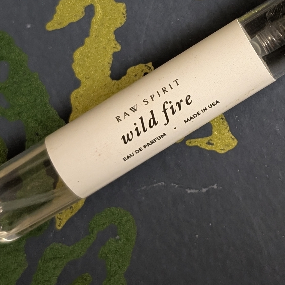 Raw spirit Wild Fire EDP PARFUM fragrance .27 oz spray vial,≈60% full